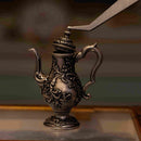 1:12 scale miniature vintage silver lidded tea kettle, part of a 3-piece dollhouse metal tea set with ornate lid detail