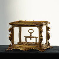 1:6 scale medieval palace metal wine case miniature placed on a classical wooden table, elegant vintage display cabinet for desk decor