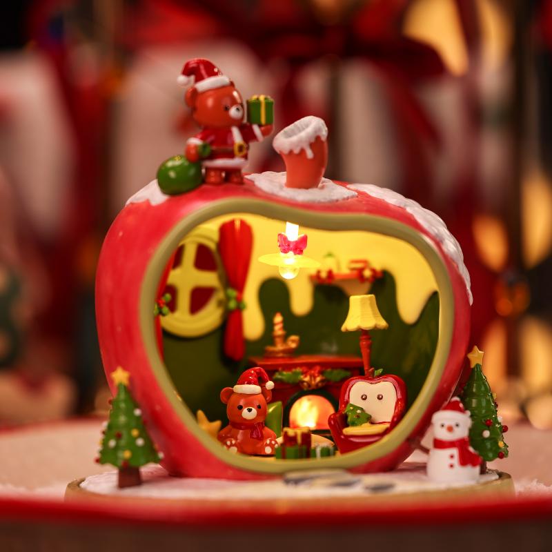 Cozy red apple miniature house with warm LED glowing inside - Miniento