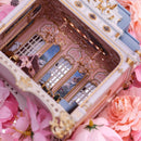Close-up of ornate interior carvings in 1/64 French palace room box - miniento