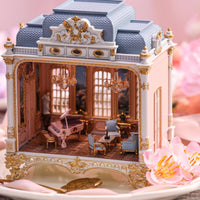 Side view of 18th-century style French palace miniature with LED lights - miniento