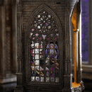 Close-up of stained glass window on Gothic Cathedral miniature ornament - Miniento