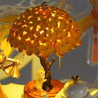 Laurel Rabbit LED lamp glowing tree leaves detail, enchanting 1:12 scale miniature night light with warm illuminated foliage