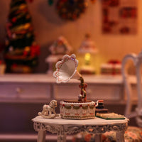 Mini Gramophone vintage decor piece displayed next to Cream Puppy ornament, aesthetic desktop miniature collectible set