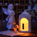 Starry Dream Prelude European classical resin table lamp warm glow displayed in a dark vintage room, ambient home decor lighting
